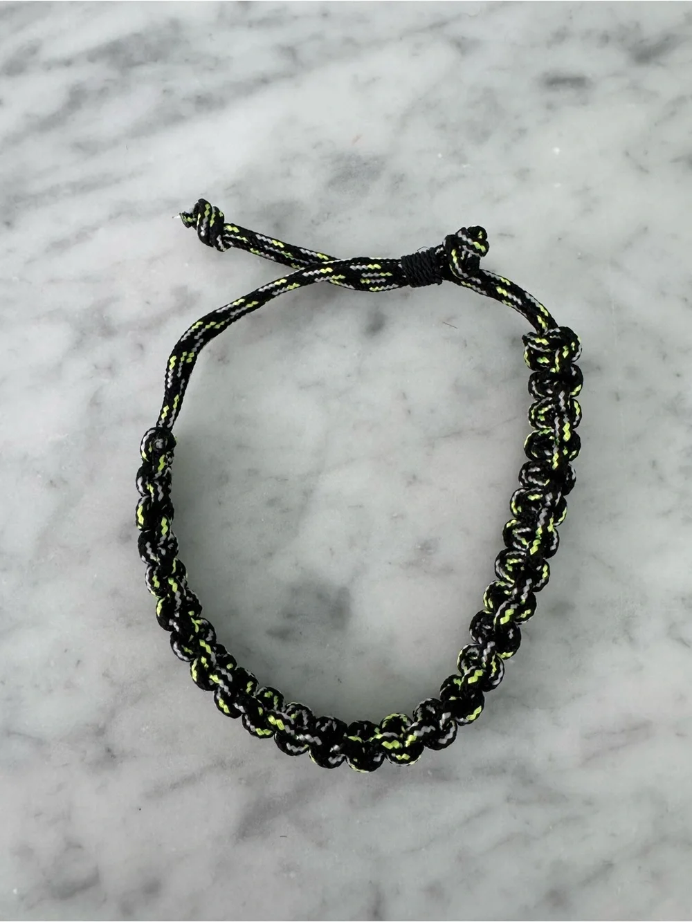 Black and green snake knot bracelet